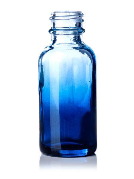 Cobalt blue glass bottle with rounded shoulders and narrow neck